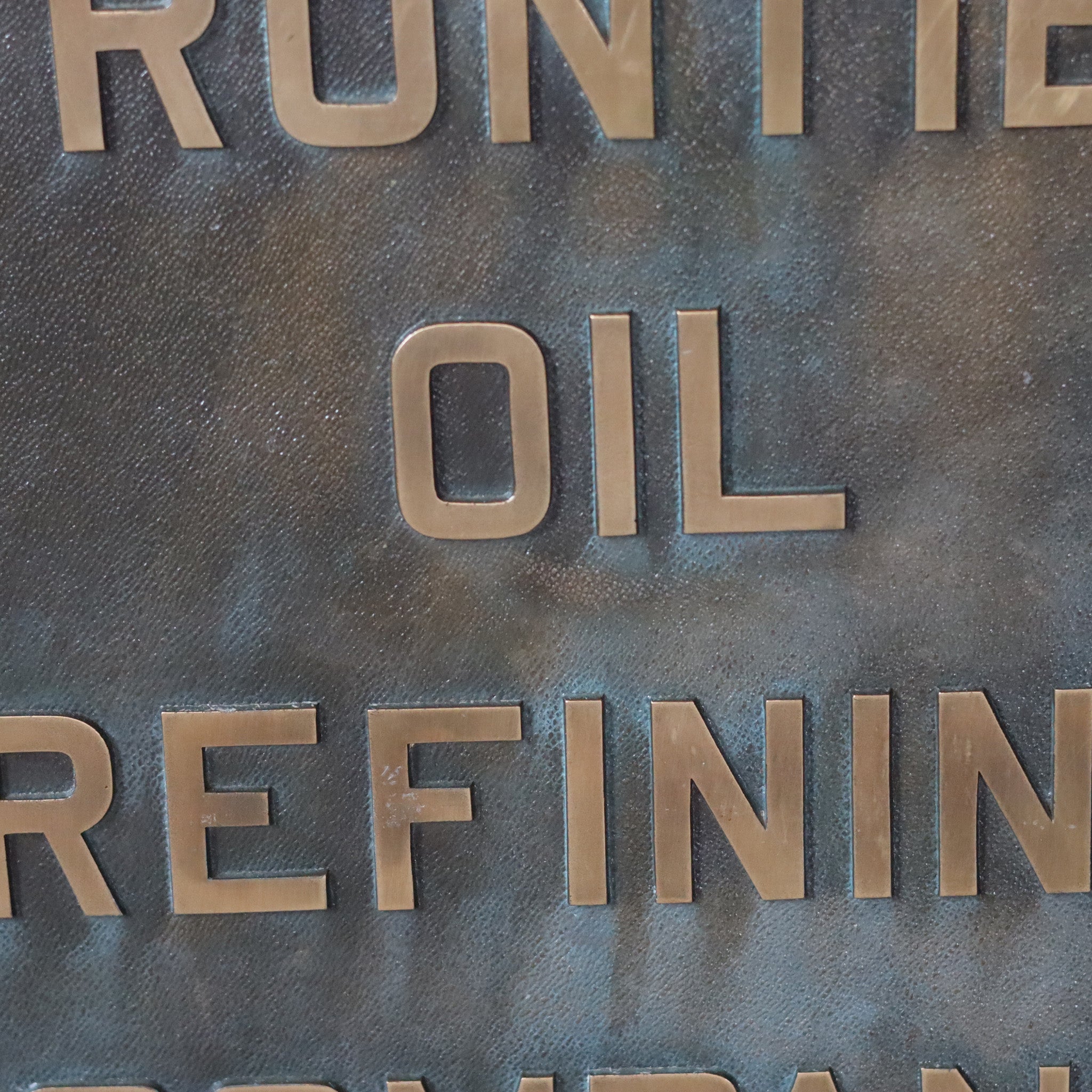 Brass Frontier Oil Sign